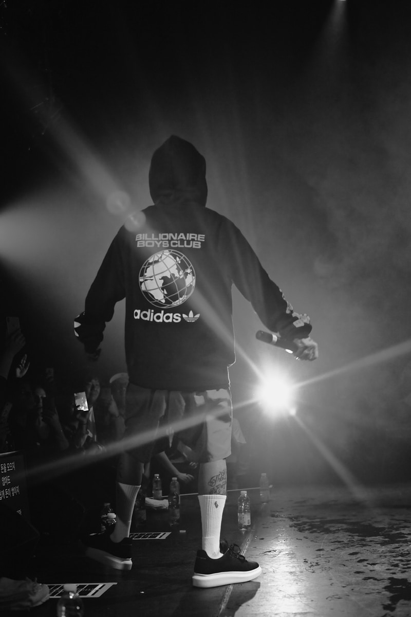 grayscale photography of man in pullover hoodie