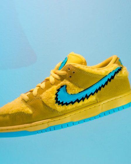 yellow and white nike low top sneakers