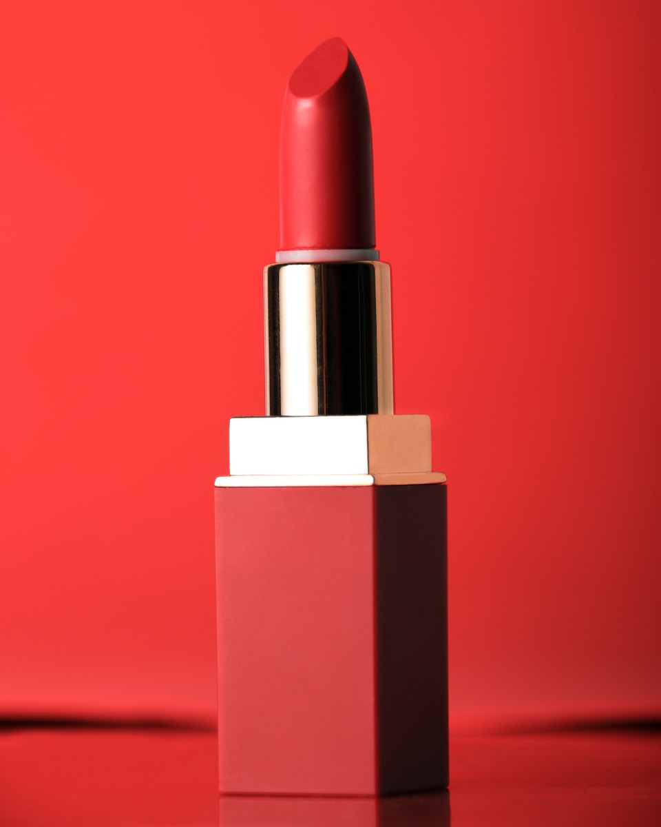 red lipstick on red surface