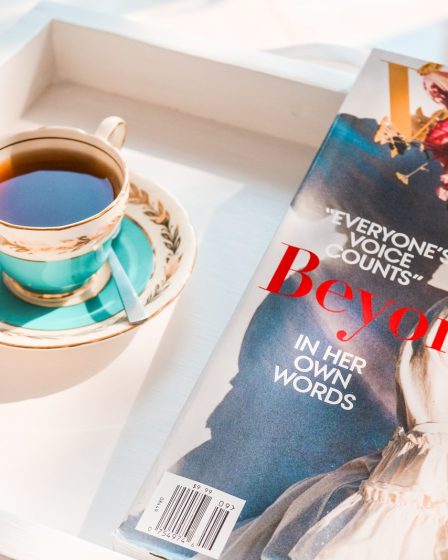 Beyonce magazine near tea on teacup