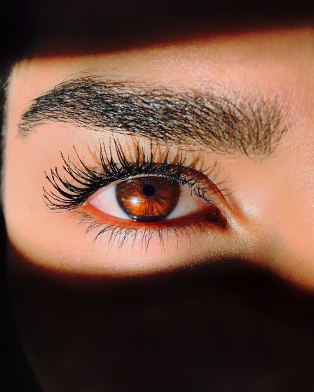 closeup photo of a woman's red eye